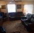 LIVING AREA WITH TWO ELECTRIC  RECLINER COUCHES &  USB CHARGING PORTS