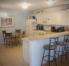 BREAKFAST BAR AREA WITH SEATING FOR THREE