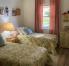 Second bedroom with twin beds, both with electric frames.  New wooden floors