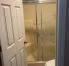 Primary bath with shower and privacy toilet.