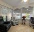 Florida Room/Third Bedroom/Office with twin bed has access to the backyard and patio. Two recliner chairs makes it a wonderful space for reading or conversation.  Computer desk and comfortable chair great for laptop work while vacationing.

