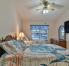 Second Bedroom has queen and twin beds, dresser and walk-in closet.  Flat screen smart TV for streaming your favorite movies, sports or shows. Ironing board and iron are in closet.