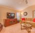 Spacious living room.  Plantation shutters. 