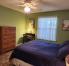 Master bedroom king size bed golf view
