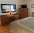 Master dressers, TV, and mirror.