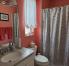 Jack and Jill bathroom with a tub.