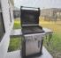 Weber propane grill with tools