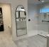 Bathroom #1 - Primary Bathroom - Walk-In Shower with Grab Bar; Dual Vanities; Walk-In Closet