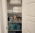 Linen closet with towels, beach towels, and one extra set of king sized sheets
