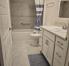 Main bath tub/shower with safety bar